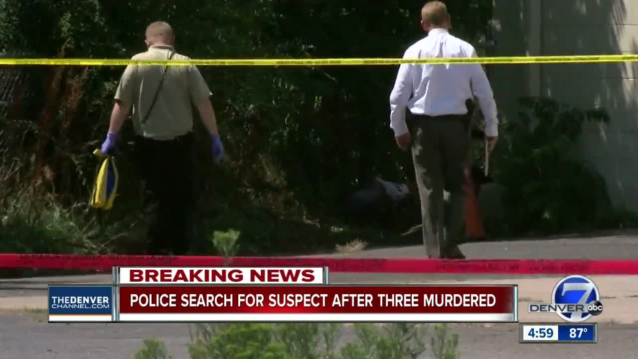 Investigators working behind police tape at a breaking news crime scene